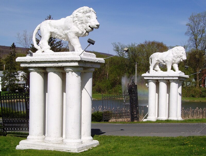 The concrete lions in front of the Spruces