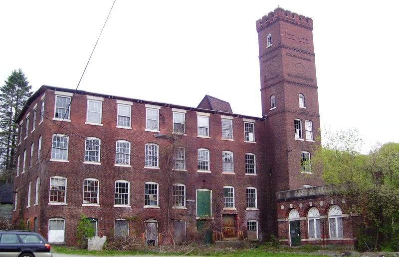 A contemporary photo of the Barber Leather Company building.