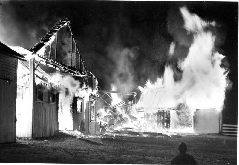 Photograph of the fire at S.B. Dibble Lumber Company in 1953.